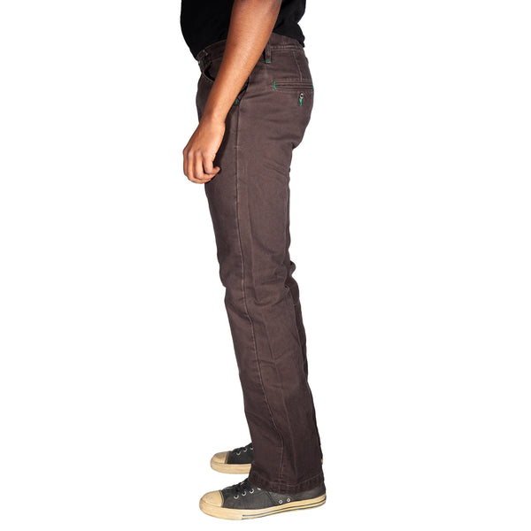 Person wearing brown pants on a white background