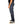 Person wearing dark blue jeans on a white background