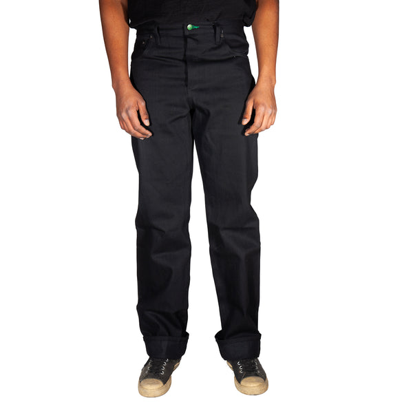 Person wearing black pants on a white background