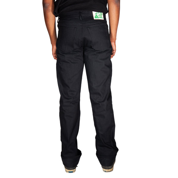 Person wearing black pants on a white background