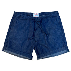 Blue shorts with a brand label on a white background