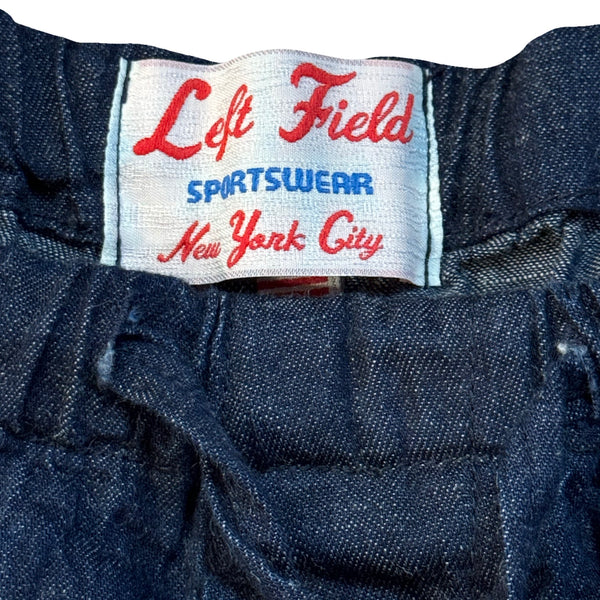 Close-up of a denim fabric with a 'Left Field Sportswear New York City' label.
