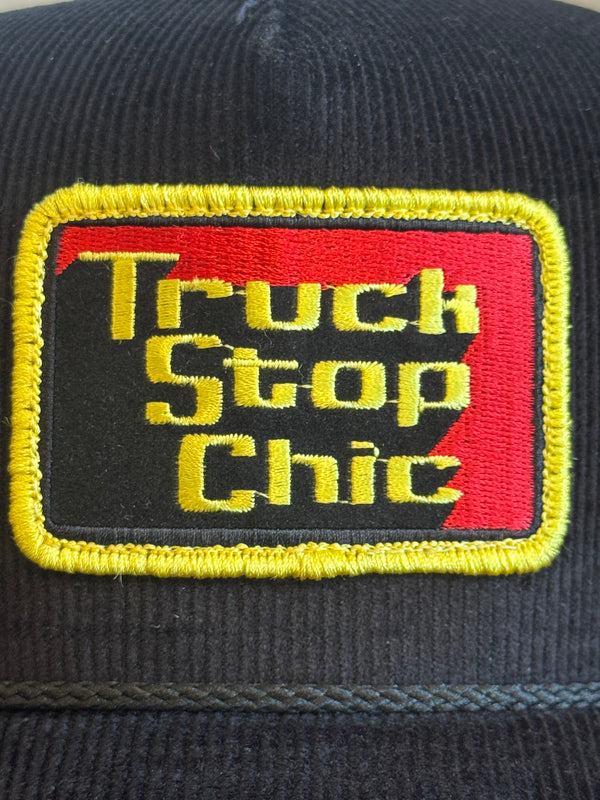 Patch with 'Truck Stop Chic' text on a black background