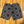 Black and white patterned shorts on a wooden floor