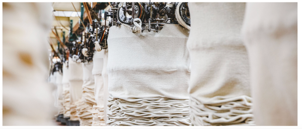 Close-up of a white textured fabric with blurred background