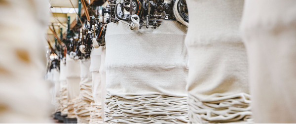 Row of white loop wheel fabric 