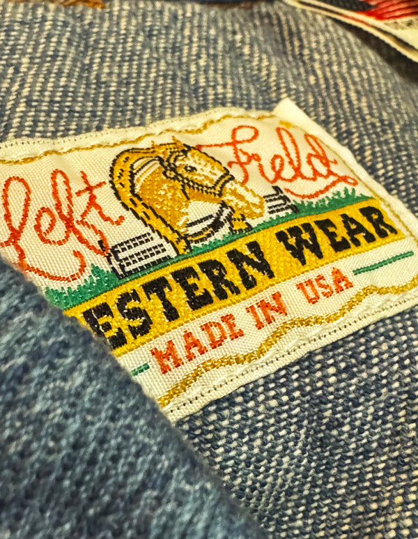 Patch on denim fabric with 'Left Field Western Wear' branding