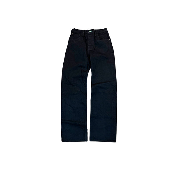 A pair of dark navy blue denim jeans laid flat against a solid white background.