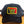 Black trucker hat with 'Truck Stop Chic' patch on a wooden surface