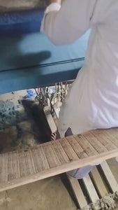 Video of a man handlooming fabric